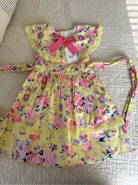 Ivy City Co Aster Yellow Floral Dress with Pink Bow